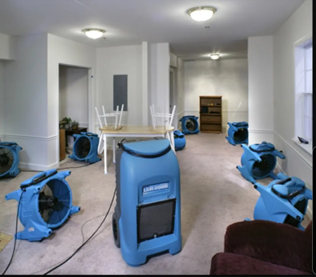 Air movers and dehumidifier setup for Water Damage Restoration in Boone